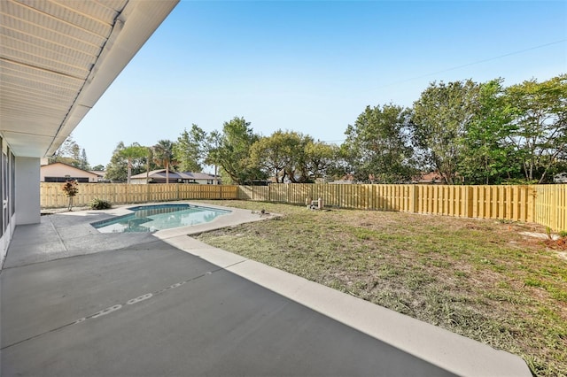 view of pool with a fenced in pool, a patio, and a fenced backyard