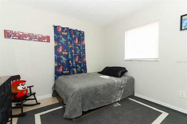 bedroom with baseboards