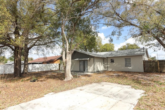 exterior space featuring fence and a patio