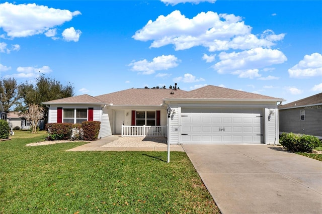 single story home with an attached garage, concrete driveway, a porch, and a front yard