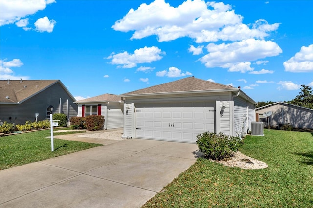 ranch-style house with a garage, concrete driveway, central AC, and a front yard