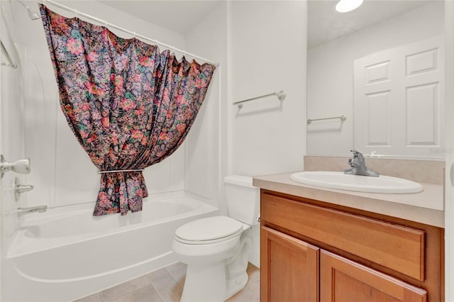 full bath featuring vanity, shower / bath combo with shower curtain, and toilet