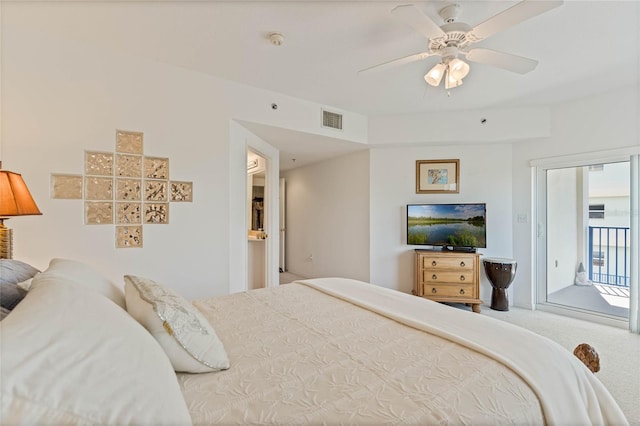 carpeted bedroom featuring access to outside, visible vents, and a ceiling fan