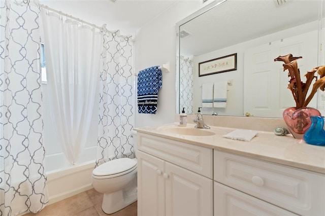 full bathroom with toilet, tile patterned flooring, shower / bath combo, and vanity