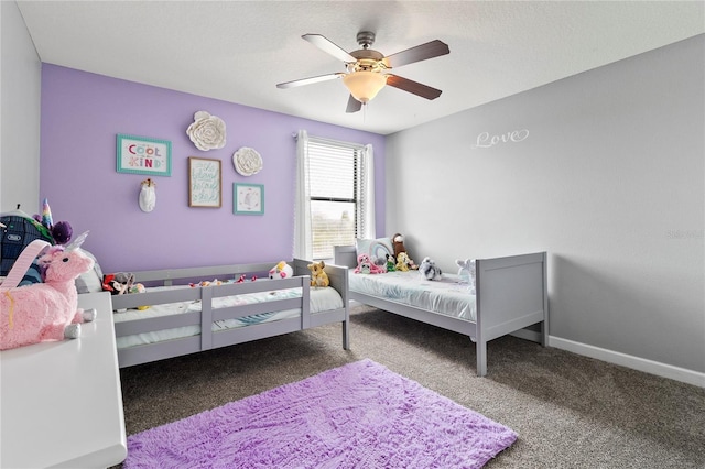 bedroom featuring a ceiling fan, baseboards, and carpet floors