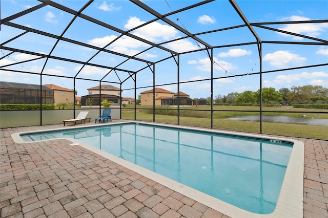 pool featuring a lanai and a patio area