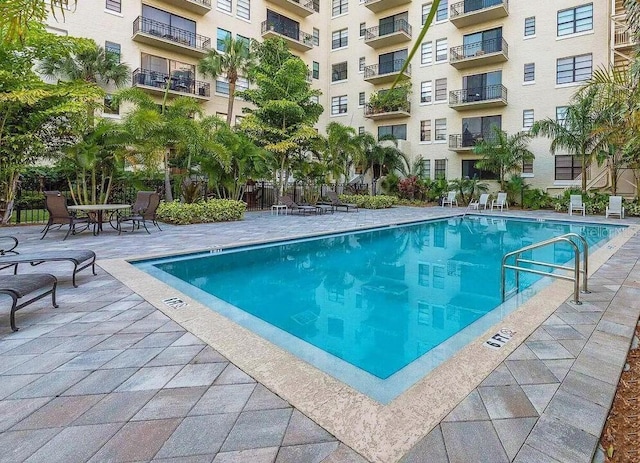 pool with a patio area