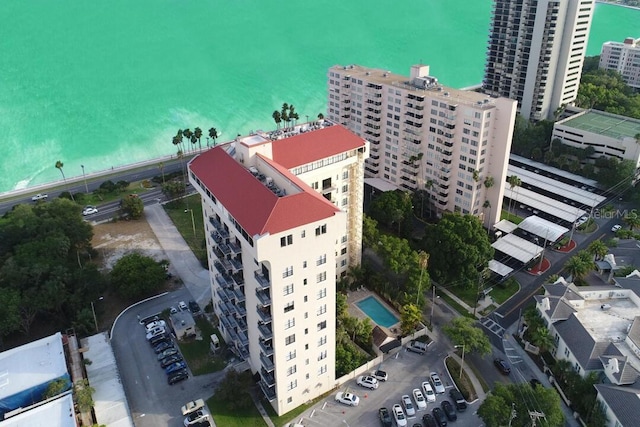 aerial view featuring a view of city and a water view