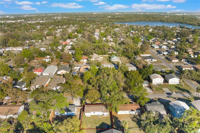 aerial view featuring a water view and a residential view