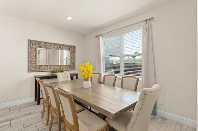 dining space with baseboards