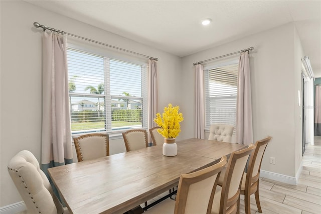 dining space with baseboards