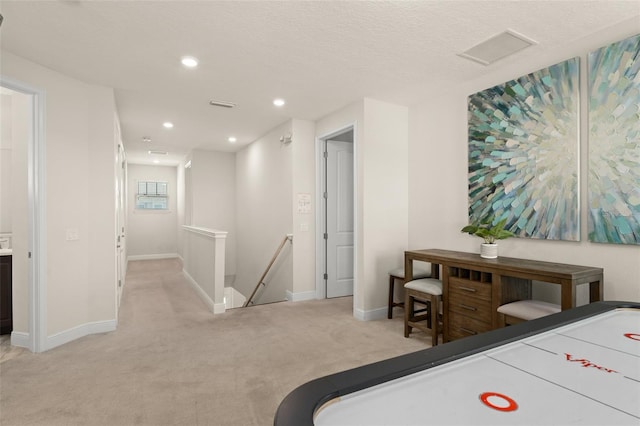 playroom with baseboards, recessed lighting, visible vents, and light carpet