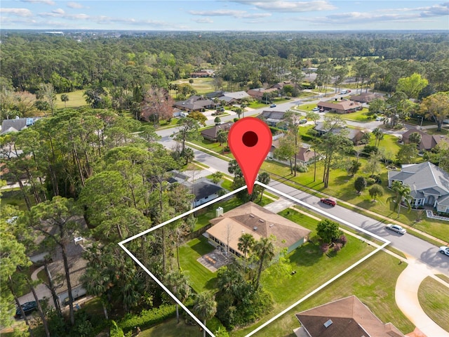 aerial view with a view of trees and a residential view