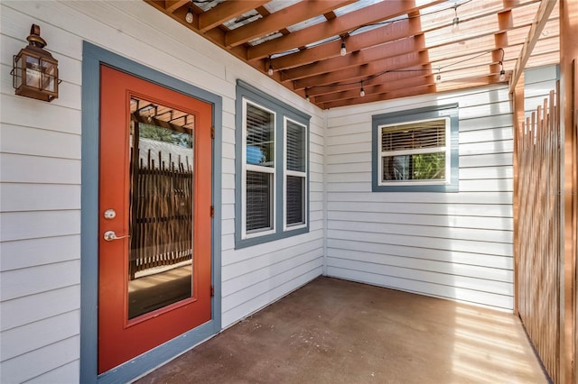 property entrance featuring covered porch