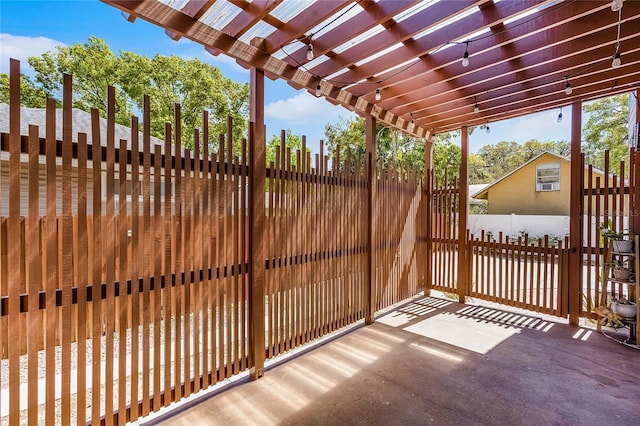 exterior space featuring a patio, fence, and a pergola