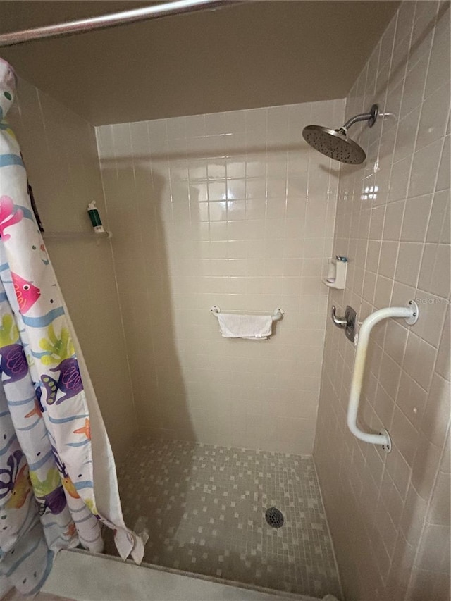 full bathroom with a stall shower