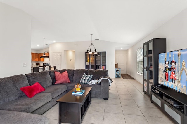 living room with lofted ceiling, light tile patterned floors, and recessed lighting