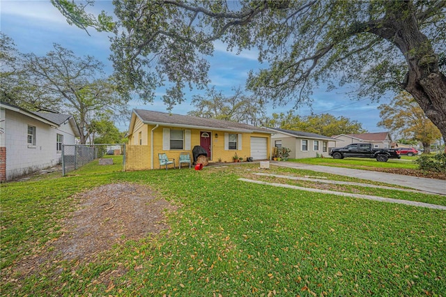 view of front of property with brick siding, fence, a garage, driveway, and a front lawn