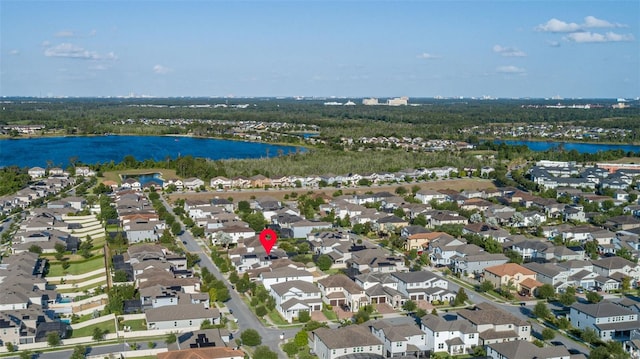 bird's eye view with a water view and a residential view