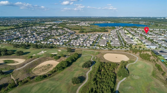 bird's eye view featuring a water view, a residential view, and golf course view