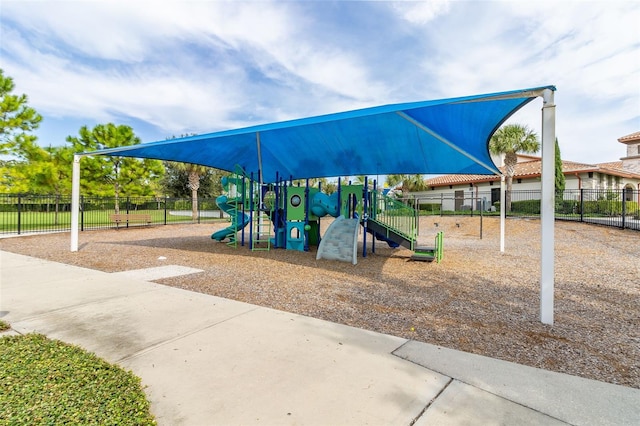 community jungle gym with fence