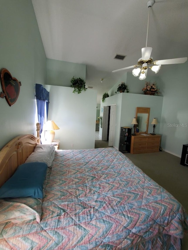 bedroom featuring high vaulted ceiling, carpet, visible vents, and ceiling fan