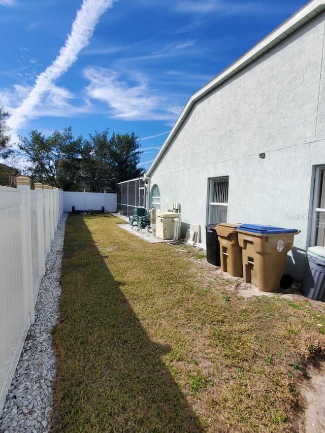 view of yard featuring a fenced backyard