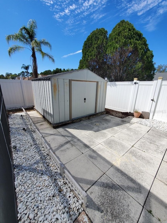 view of shed featuring a fenced backyard