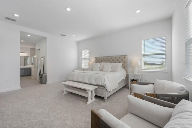 bedroom with recessed lighting, visible vents, baseboards, and light colored carpet