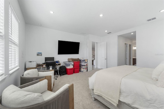 bedroom with recessed lighting, visible vents, and carpet floors