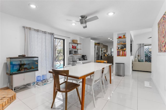 dining space with light tile patterned floors, recessed lighting, ceiling fan, a textured ceiling, and baseboards