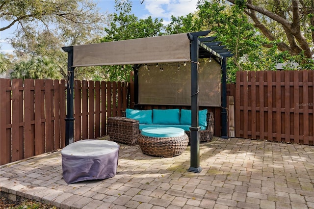 view of patio / terrace featuring outdoor lounge area and a fenced backyard