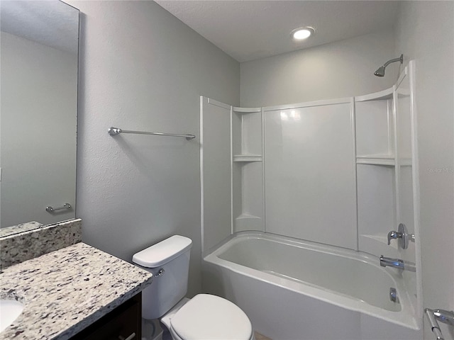 full bathroom with vanity,  shower combination, and toilet