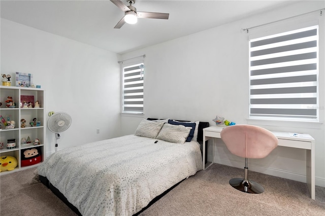 bedroom with carpet and a ceiling fan