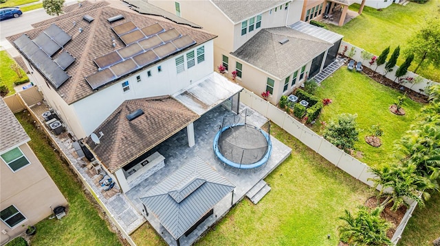 birds eye view of property with a residential view