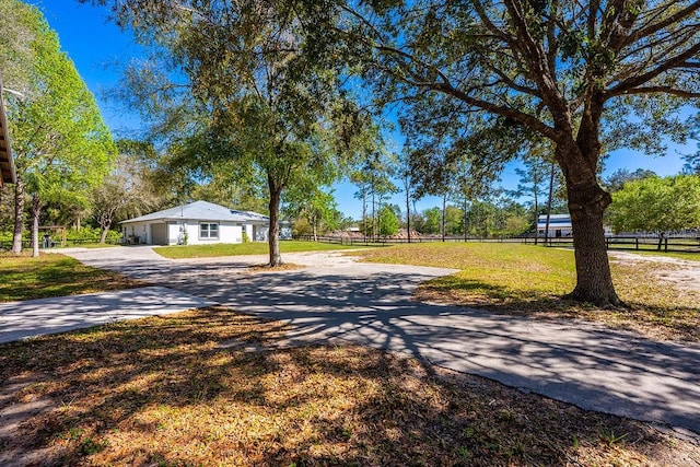 view of street featuring driveway