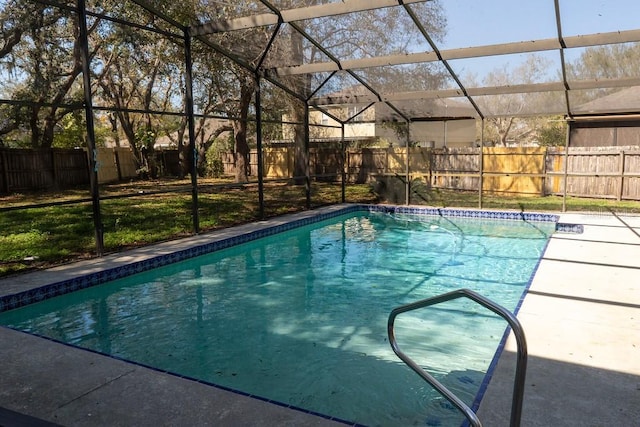 view of pool with a lanai, a fenced in pool, and a fenced backyard