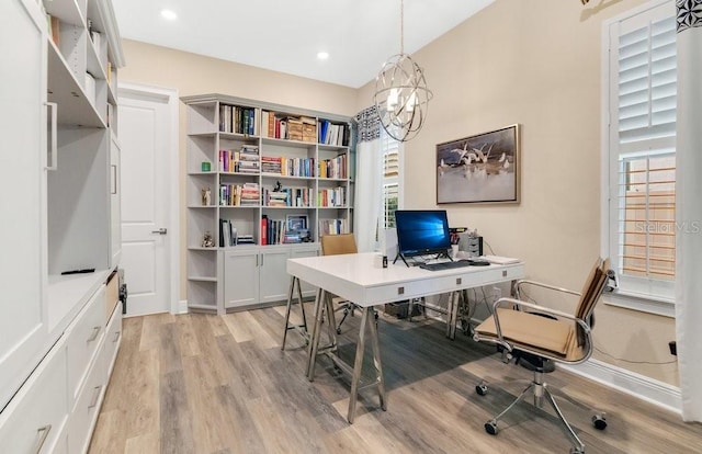 office with light wood finished floors, baseboards, a chandelier, and recessed lighting