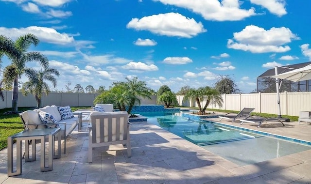 view of pool with a fenced in pool, a patio area, a fenced backyard, and an outdoor hangout area