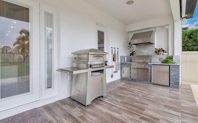 view of patio / terrace with an outdoor kitchen and grilling area