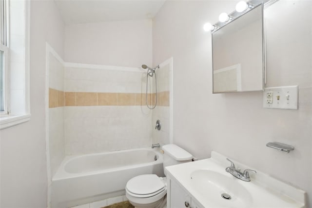 bathroom featuring toilet, washtub / shower combination, and vanity