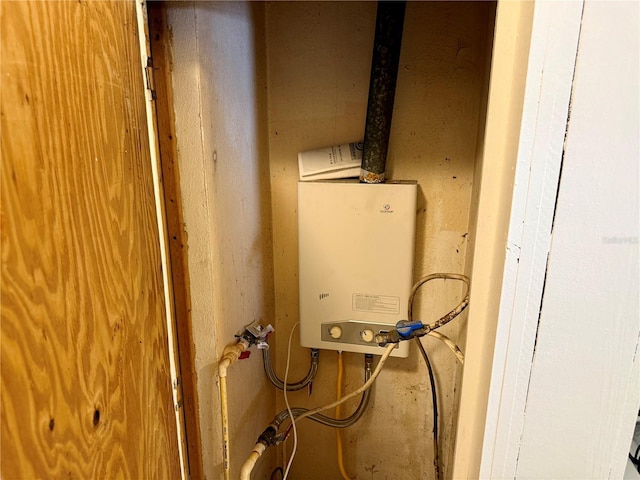 utility room with water heater