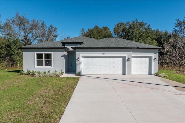 single story home with a garage, a front lawn, concrete driveway, and stucco siding