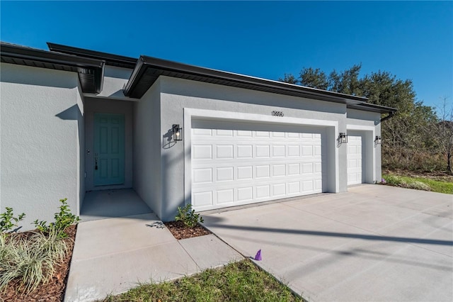 exterior space featuring concrete driveway