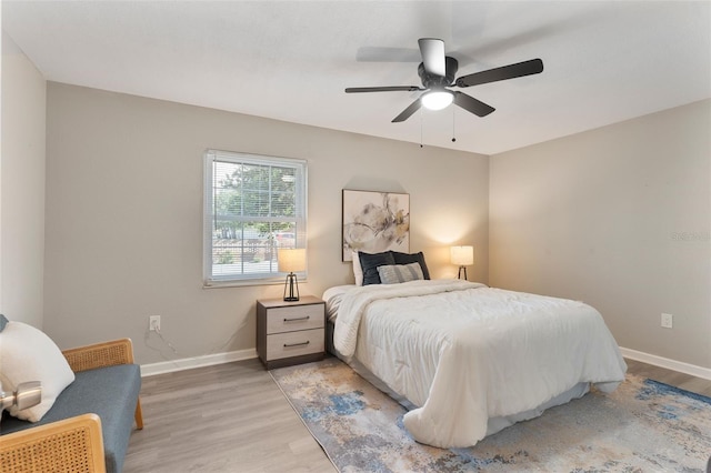 1920 E Edgewood Dr Unit A5, Lakeland, FL 33803 - bedroom with light wood-style floors and ceiling fan