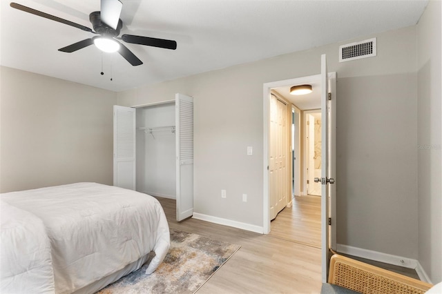 1920 E Edgewood Dr Unit A5, Lakeland, FL 33803 - bedroom with light wood finished floors, a closet, and ceiling fan