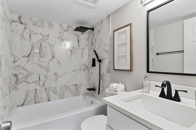 1920 E Edgewood Dr Unit A5, Lakeland, FL 33803 - full bathroom featuring vanity, shower / bathtub combination, a textured ceiling, and a textured wall