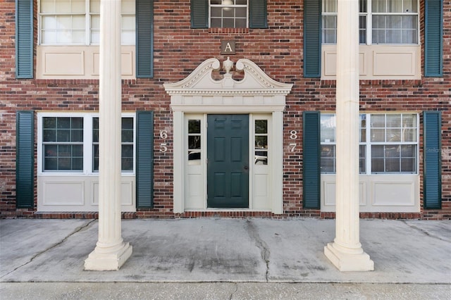 1920 E Edgewood Dr Unit A5, Lakeland, FL 33803 - entrance to property featuring brick siding