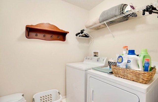 laundry area featuring independent washer and dryer and laundry area