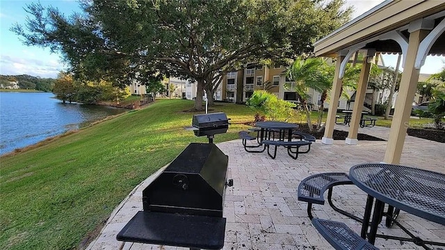 view of patio featuring a water view